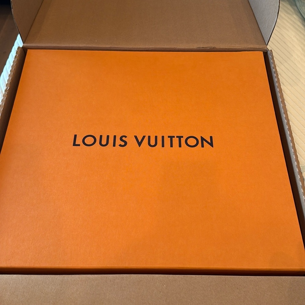 Louis Vuitton box with ribbon and gift card